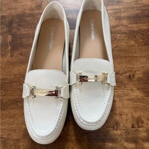 Calvin Klein Cream Loafers with Gold Accents